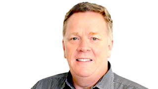 Paul Cripps a smiling business professional in a black shirt